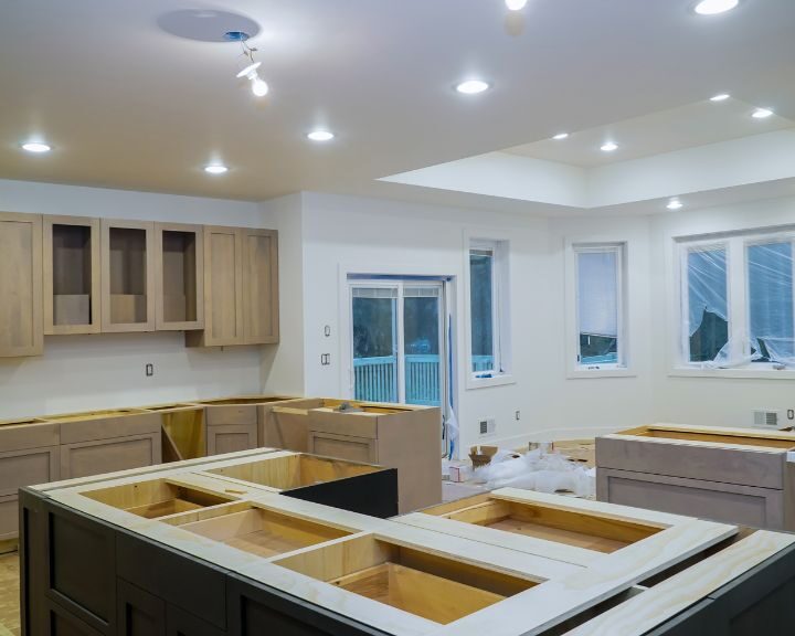 a kitchen with a lot of cabinets in it.