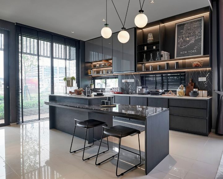 a kitchen with a bar and a dining table.